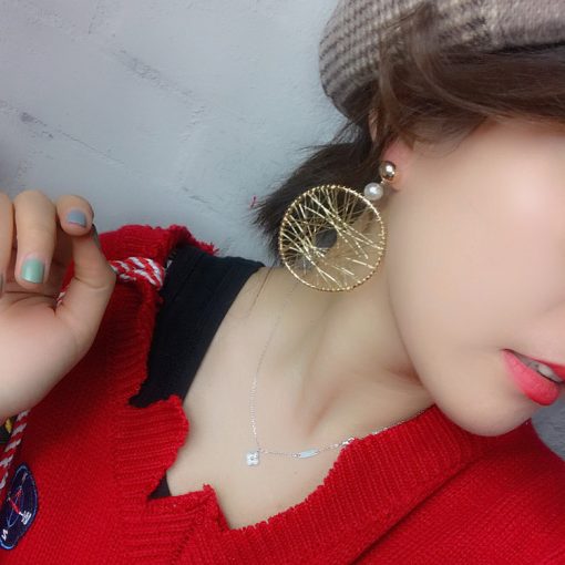 Korean version of the simple design metal geometry round thread winding exaggerated female earrings YLX-082